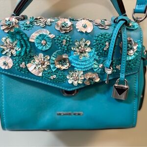 Teal leather handbag